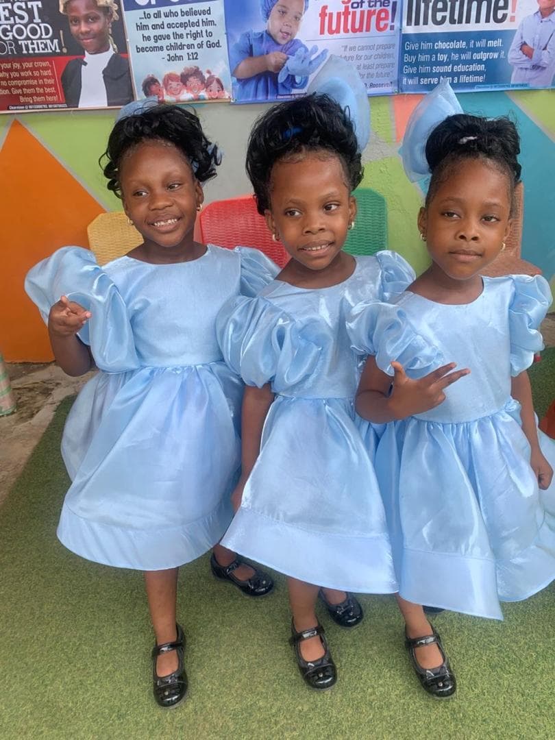 Young graduates in formal dresses at Headstone Montessori